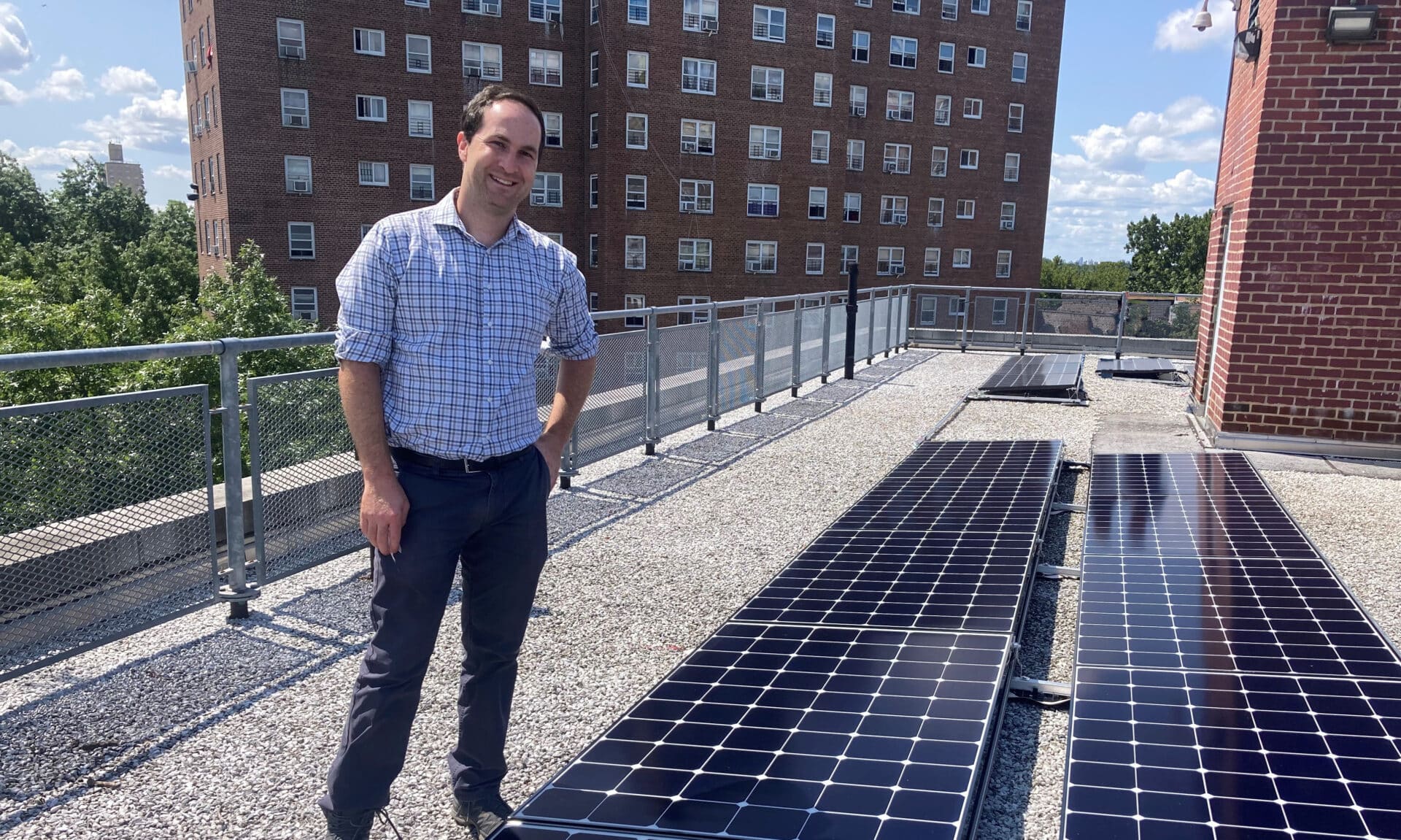 Ryan Pascucci on roof Parkside NYCHA